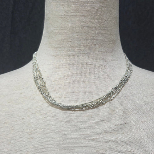 apostrophe | multistrand silver toned necklace