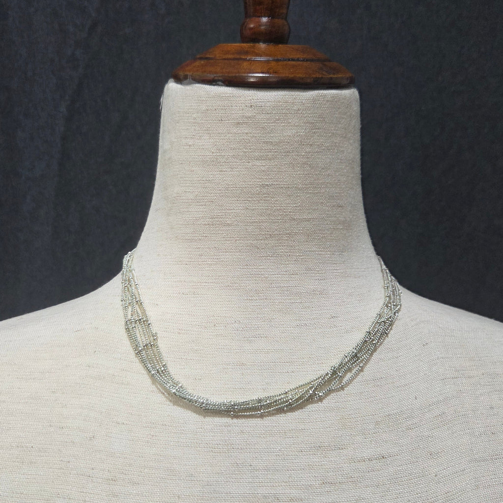 apostrophe | multistrand silver toned necklace