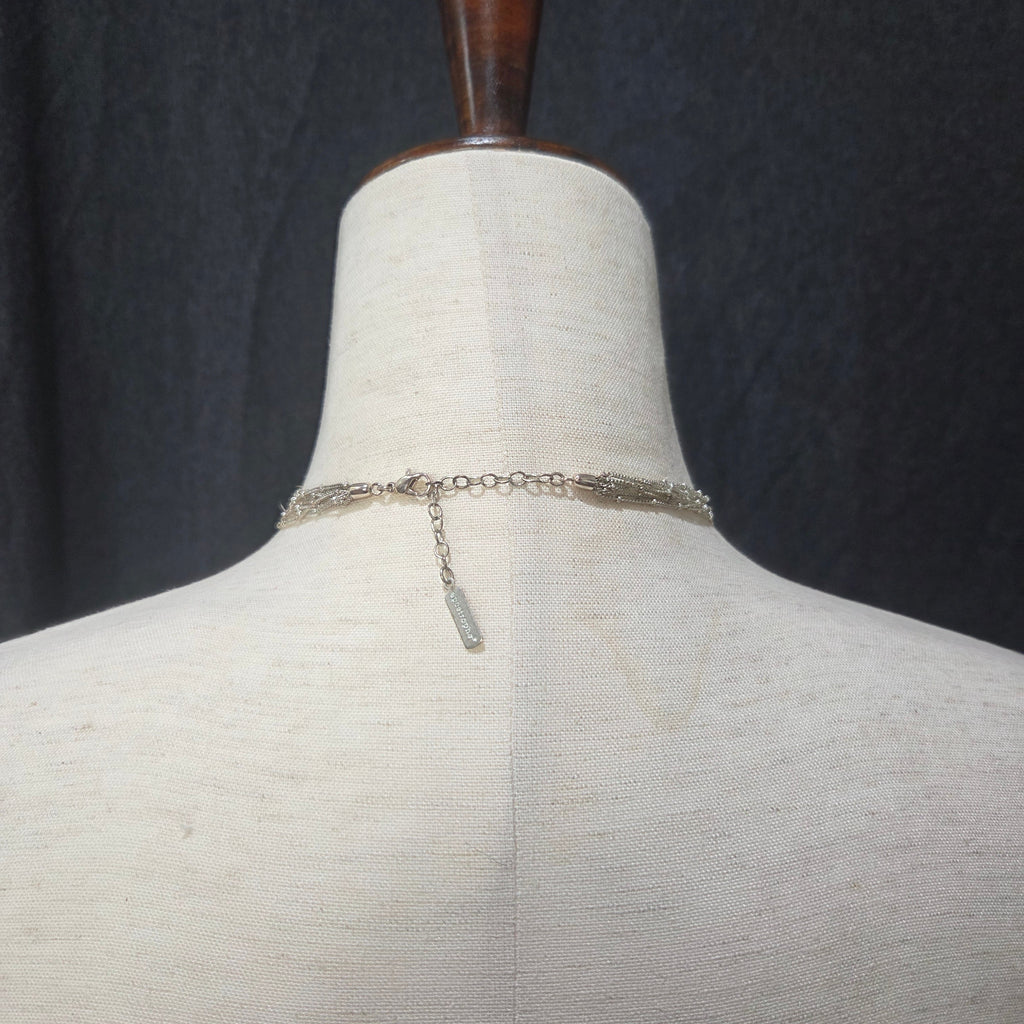apostrophe | multistrand silver toned necklace
