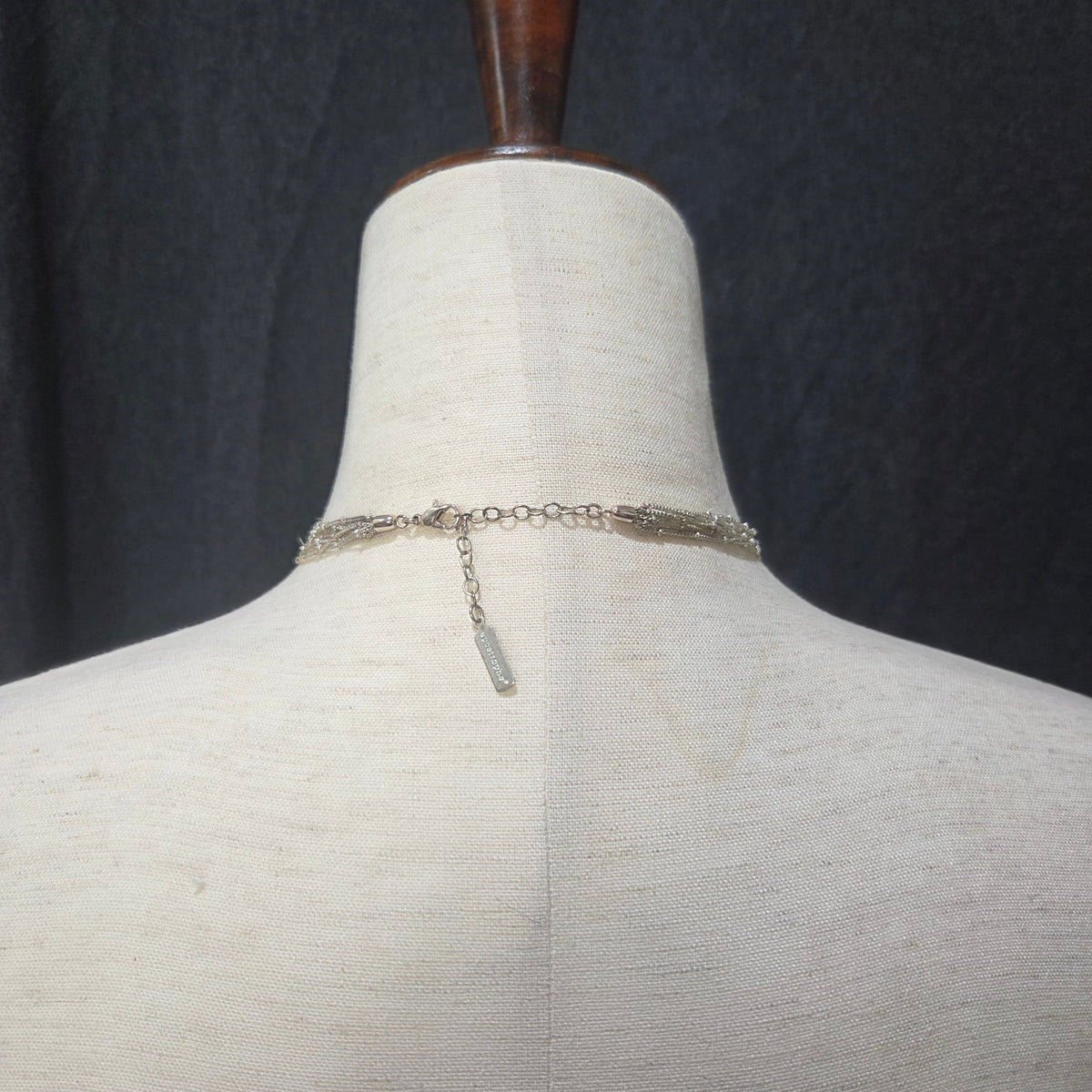 apostrophe | multistrand silver toned necklace