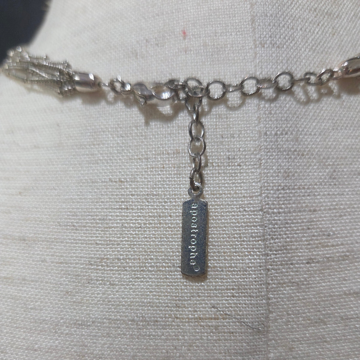 apostrophe | multistrand silver toned necklace