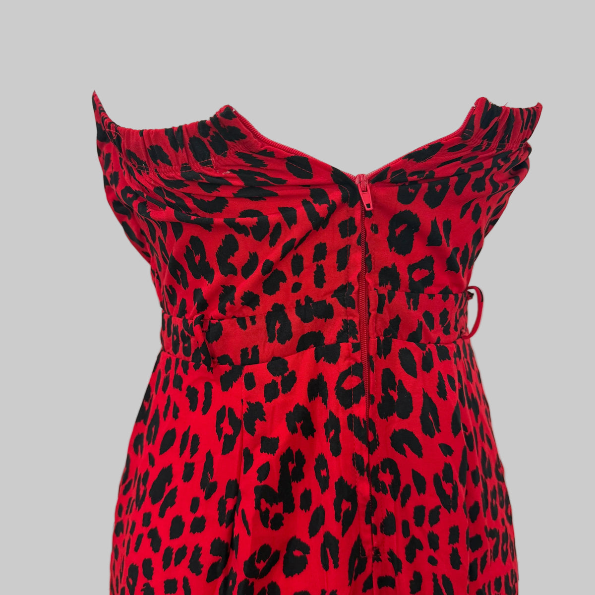 charlotte russe | Red Leopard Strapless Jumpsuit
